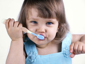 Girl Brushing Teeth.